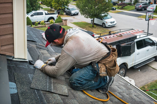 Professional Roofing technician working in Francisco, IN